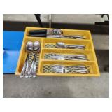 Service for four silverware and plastic Service for four silverware and plastic