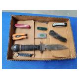 Assorted knives, multi-tool, and scale Assorted knives, multi-tool, and scale