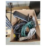 Assorted power strips and extension cords Assorted power strips and extension cords