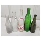 Five assorted vintage antique soda bottles Etc Five assorted vintage antique soda bottles Etc