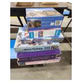 Assorted jigsaw puzzles Assorted jigsaw puzzles