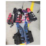 3 assorted life jackets, adult small/medium 3 assorted life jackets, adult small/medium