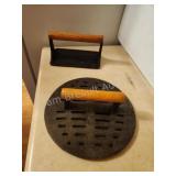 2 vintage cast iron food presses