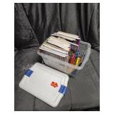 Rubbermaid storage tote of assorted children