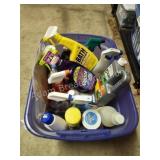 Laundry basket of miscellaneous cleaning products