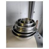9 assorted stainless steel mixing bowls