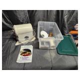 The Champion Juicer with storage tote