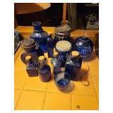 Assorted vintage cobalt blue glass bottles, jars,