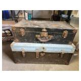 2 vintage metal steamer chests