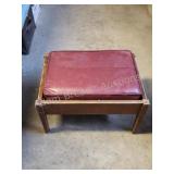 Vintage wood frame vinyl upholstered ottoman