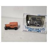 2 vintage ERTL die-cast trucks