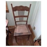 Vintage Carved Cane Seat Chair. Solid oak dining
