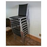 Stack of 9 Chrome & Black Stacking Chairs. Lot of