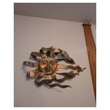 GOLD PAINTED METAL SUN FACE WALL DECOR