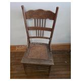 Vintage Carved Cane Seat Chair. Solid oak dining