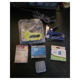 STAPLE GUN AND STAPLES LOT
