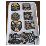 VINTAGE CAST METAL WALL PLAQUES AND TRIVETS LOT