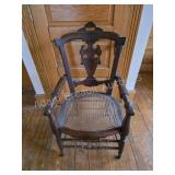 VINTAGE WOODEN ARMCHAIR WITH CANE SEAT