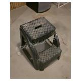 Black Plastic Step Stool. Sturdy two-step black