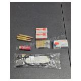 Miscellaneous ammo and Firearm lock, three rounds