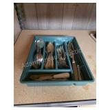 Assorted silverware and kitchen utensils
