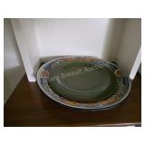 Two large decorative ornate platters