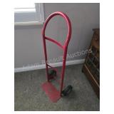 Red steel two wheeled hand truck dolly cart