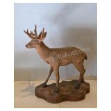 Ken Cole hand carved wooden deer figurine, left