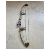 Vintage Bear compound bow, serial number 0777764