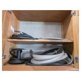Cabinet clean out - miscellaneous cable, hoses,
