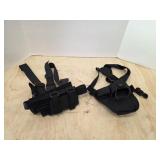2 handgun shoulder holsters
