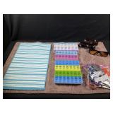 Drying Mats, Pill Containers, Scissors, Sunglasses