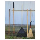 Broom, rakes and garden hoe