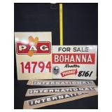 Assorted metal signs