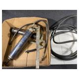 Two Grease guns with hoses
