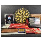 Assorted games, cassette tapes, records, and books