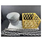 Metal bucket, chains, crate