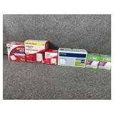 Gauze pads, white envelopes