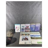 Tractor/insurance books/manuals & hats