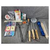 Playing cards, grill utensils, outlets, bulbs