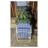 Outdoor chairs and plant