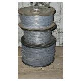 Spools of electric fence wire