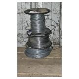 Spools of electric fence wire