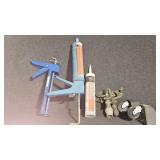 Calk guns, sprinklers, castors,  sealant