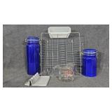 Canisters, dish strainer, glass measuring cup