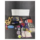 Fridge magnets, pill cutter, wine corks, Lazer