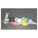 Measuring cups, corn picks, spatulas, and more