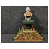 Cast Iron Magician Coin Bank