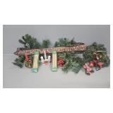 Merry Christmas sign, candles, greenry