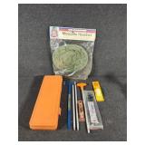 Mosquito head net, gun cleaning kit